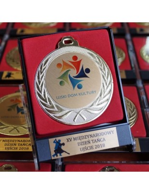 Medal stalowy w etui plastikowym z wklejką i tabliczką
